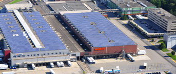 Zentrale der Migros Waadt aus der Vogelperspektive Zentrale der Migros Waadt aus der Vogelperspektive